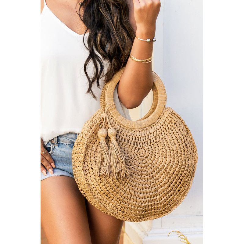 The Tassel O-Ring Straw Tote Bag In Khaki or Off White