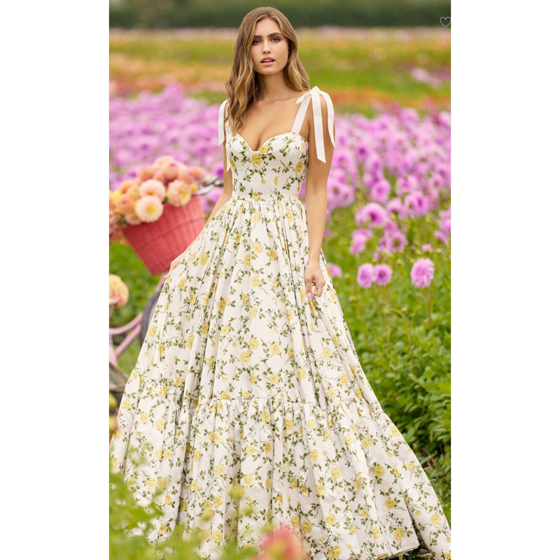 The Sherri Hill Ivory/Yellow Floral Sweetheart Neckline Bow Strap Gown