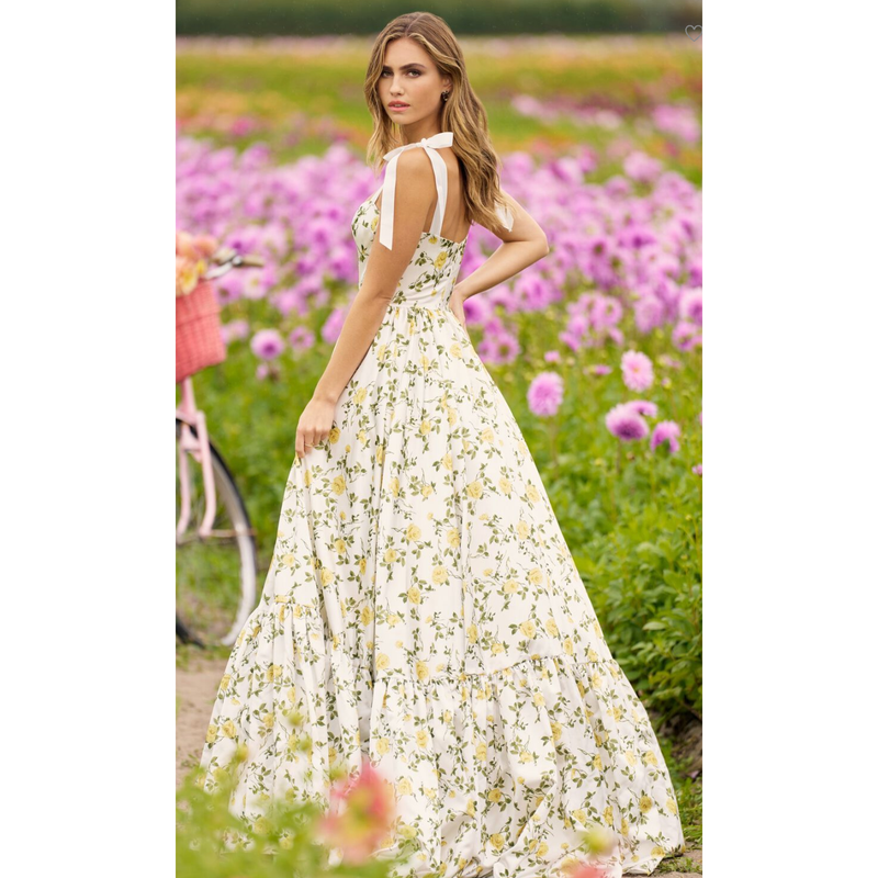 The Sherri Hill Ivory/Yellow Floral Sweetheart Neckline Bow Strap Gown