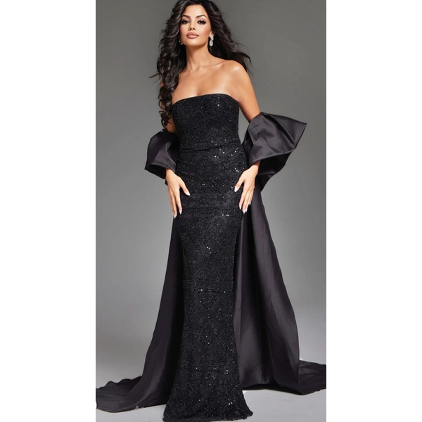 The Jovani 42137 Black Strapless Beaded Formal Gown with Cape