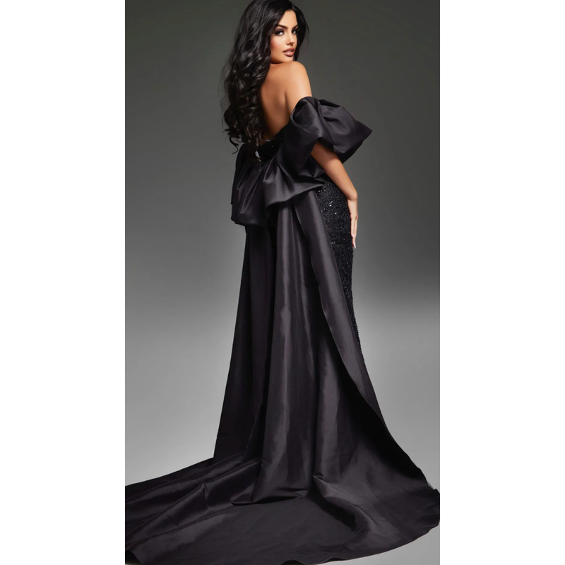 The Jovani 42137 Black Strapless Beaded Formal Gown with Cape